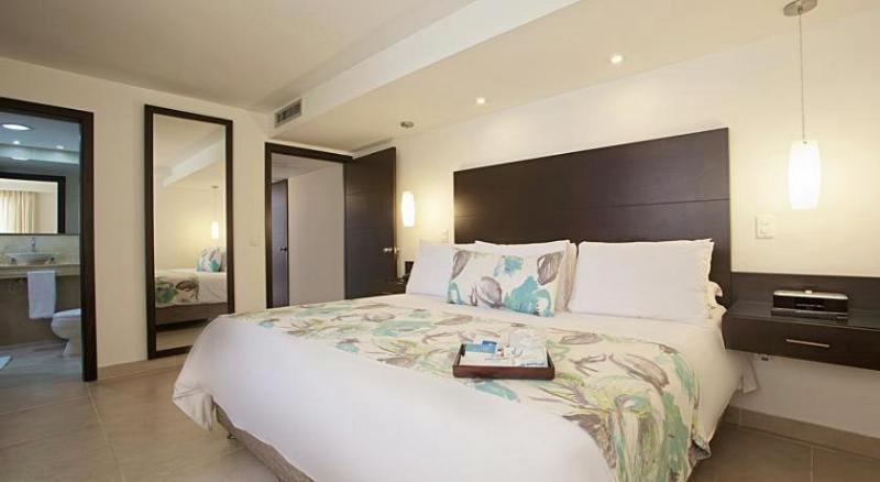 Hotel Capilla Del Mar Cartagena Room photo A bedroom at the hotel